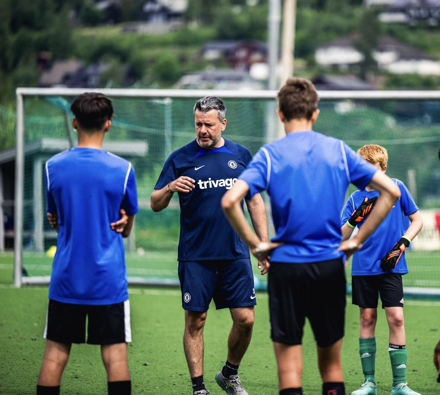 Rusty coaching young footballers during a Chelsea training session