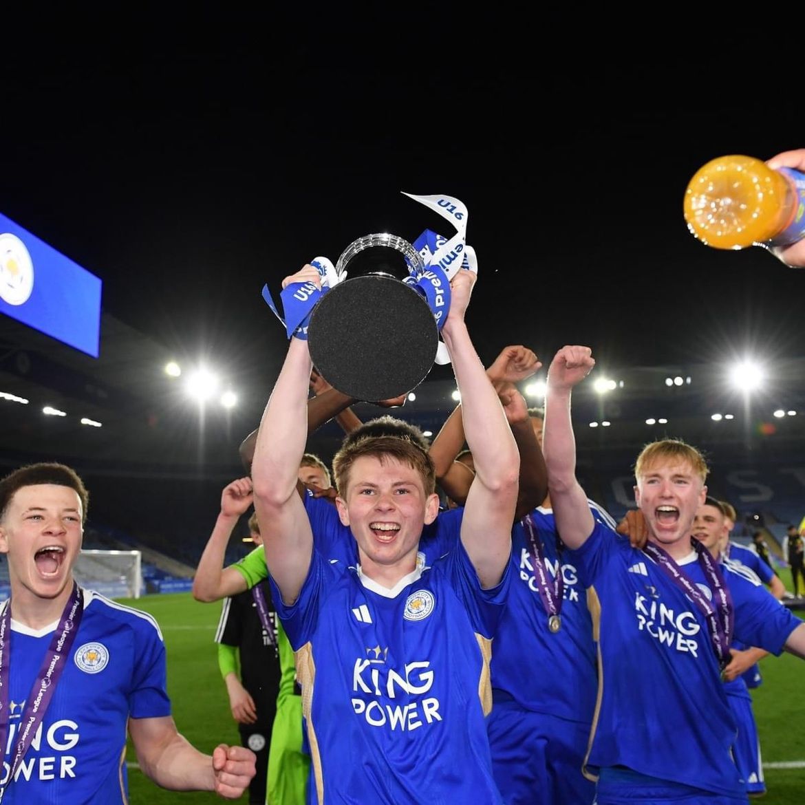Will celebrating with Leicester City teammates and a trophy